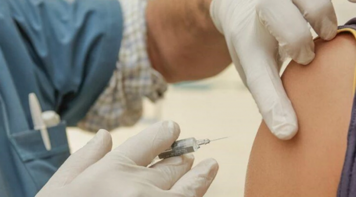 Person receiving Covid vaccine