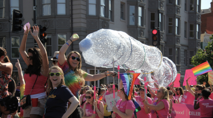 Revelers carry a gigantic condom through the streets at the Capital Pride parade in Washington, D.C.
