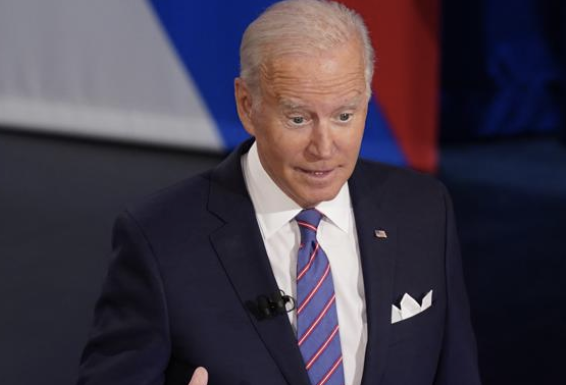 President Joe Biden participates in a CNN town hall at the Baltimore Center Stage Pearlstone Theater, Thursday, Oct. 21, 2021, in Baltimore, with moderator Anderson Cooper.