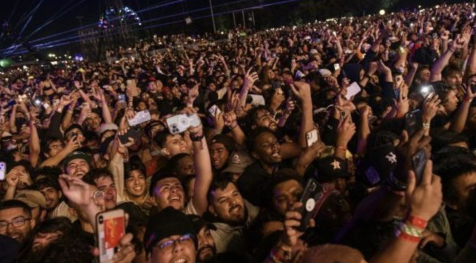 The crowd watches as Travis Scott performs at Astroworld Festival. / PHOTO: Associated Press
