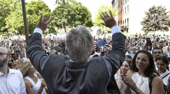 Robert F. Kennedy, Jr. speaks at a rally outside the Albany County Courthouse Wednesday, Aug. 14, 2019, in Albany, N.Y., following a hearing about vaccine religious exemptions. An investigation by The Associated Press finds that Children’s Health Defense has raked in money and followers as Kennedy used his star power as a member of one of America’s most famous families to open doors, raise money and lend his group credibility.