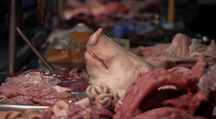 FILE PHOTO: Pig parts for sale in cultural meat market