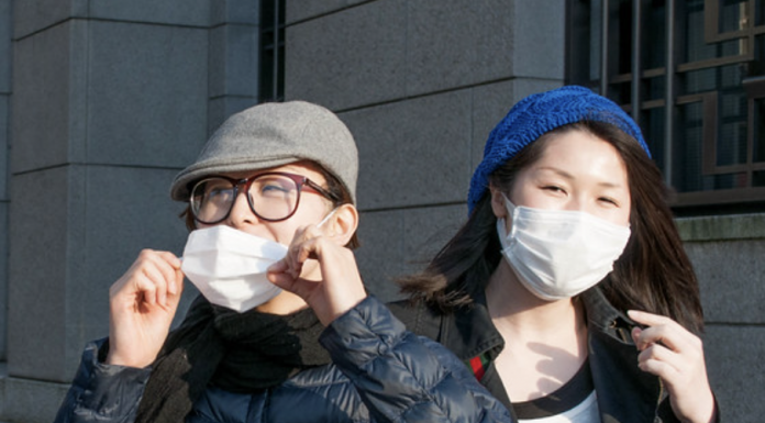 File photo, women in Japan wearing masks Jeena Paradies (CC BY 2.0)