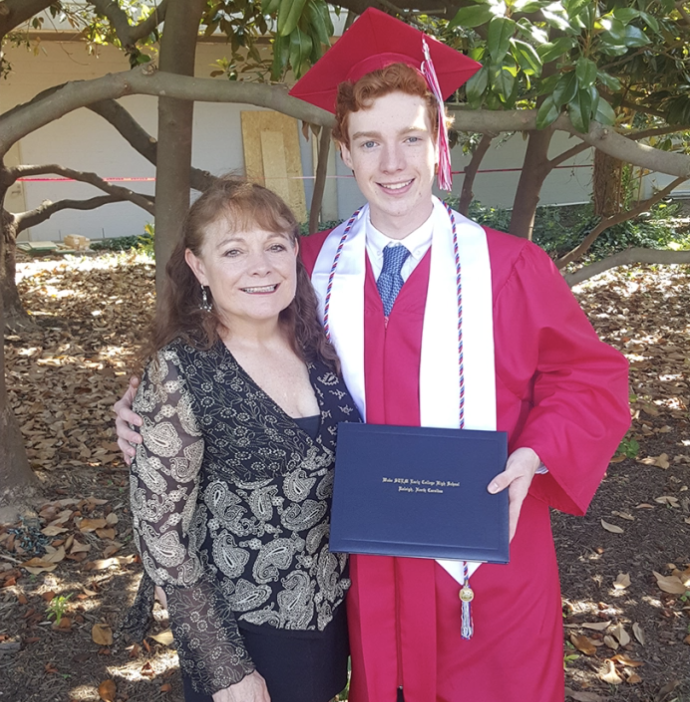 Tyler Gilreath and his mother, Tamra Demello, pose after his high school graduation in May 2019.(ALEX EDDY)