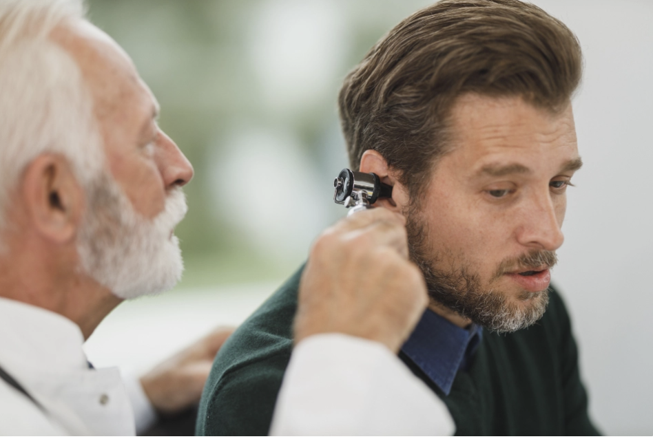 Man receives hearing exam