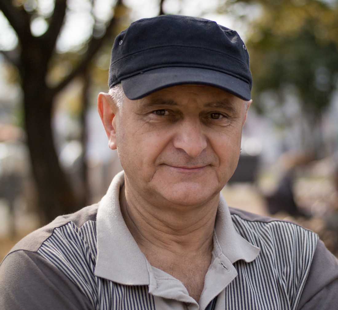 Portrait of an older man with baseball cap