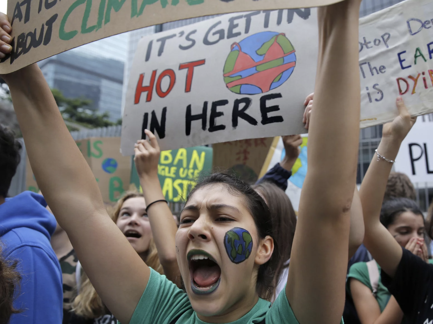 Schoolchildren take part in a climate protest