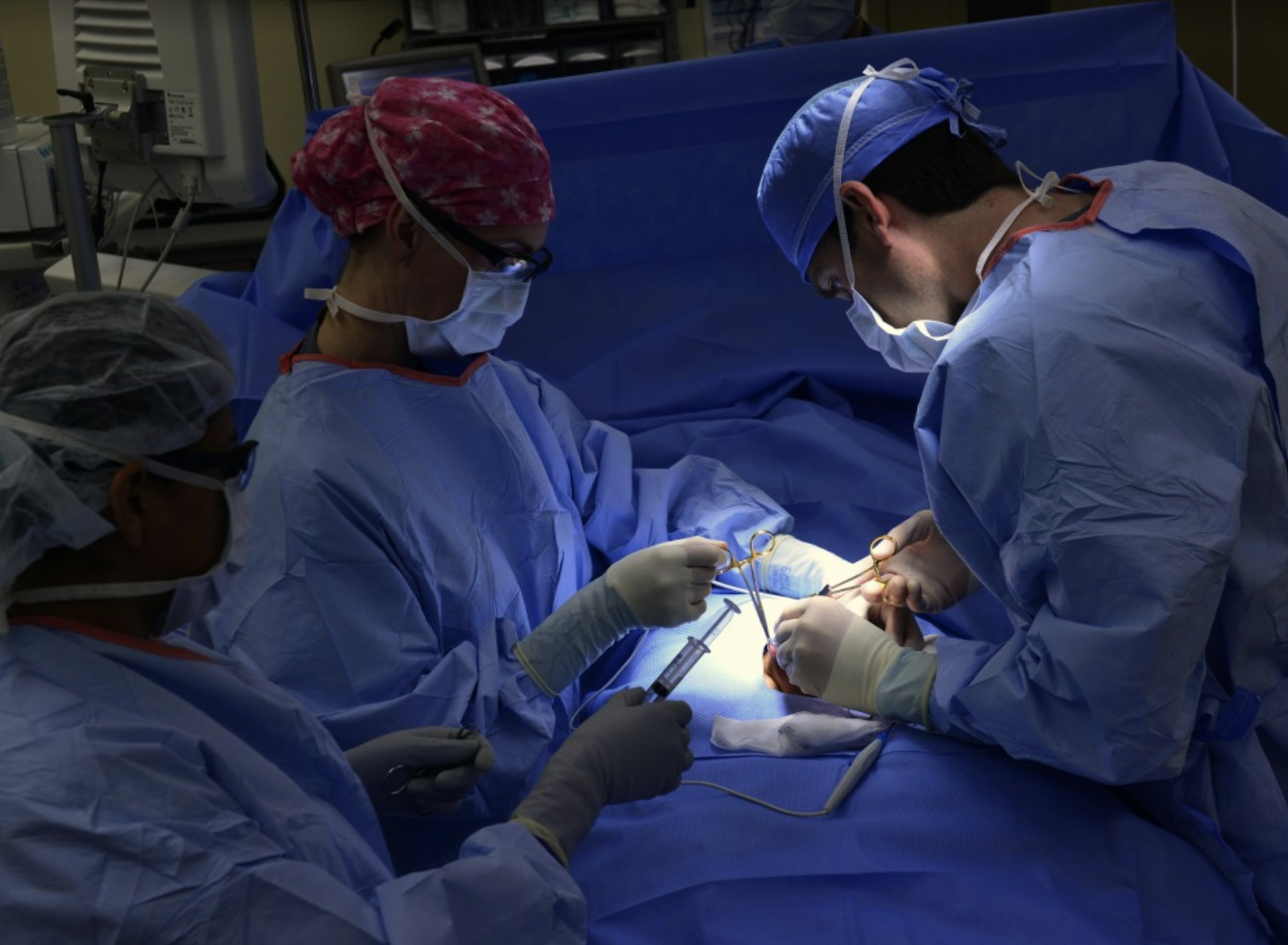 Doctors conducing an operation