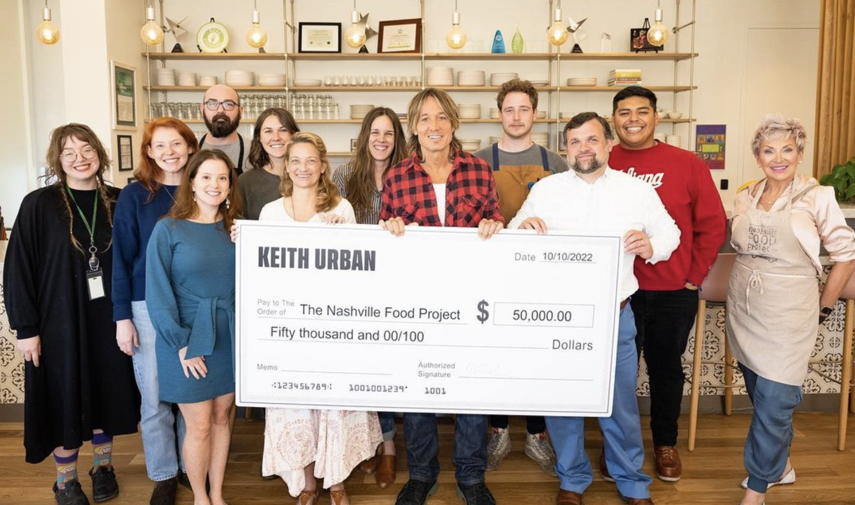 Keith Urban presents $50,000 check to The Nashville Food Project