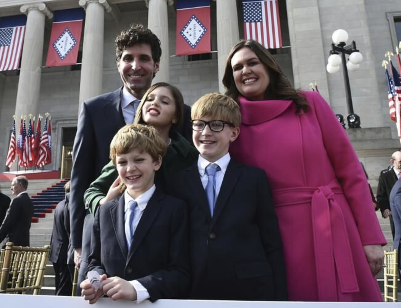 Arkansas Gov. Sarah Huckabee Sanders poses for a picture with husband Bryan and children Scarlett, Huck, and George