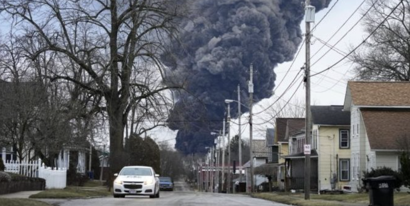 A black plume rises over East Palestine, Ohio, as a result of a controlled detonation of a portion of the derailed Norfolk Southern trains Monday, Feb. 6, 2023.