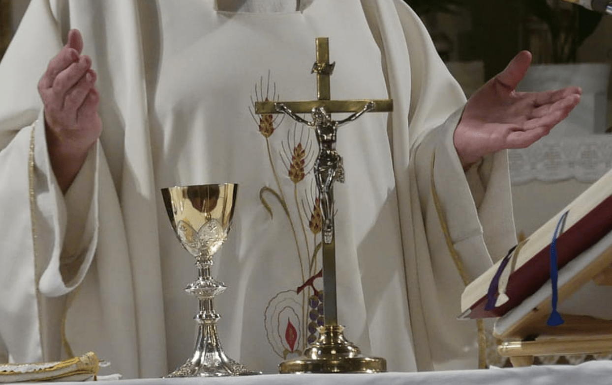 Priest saying mass
