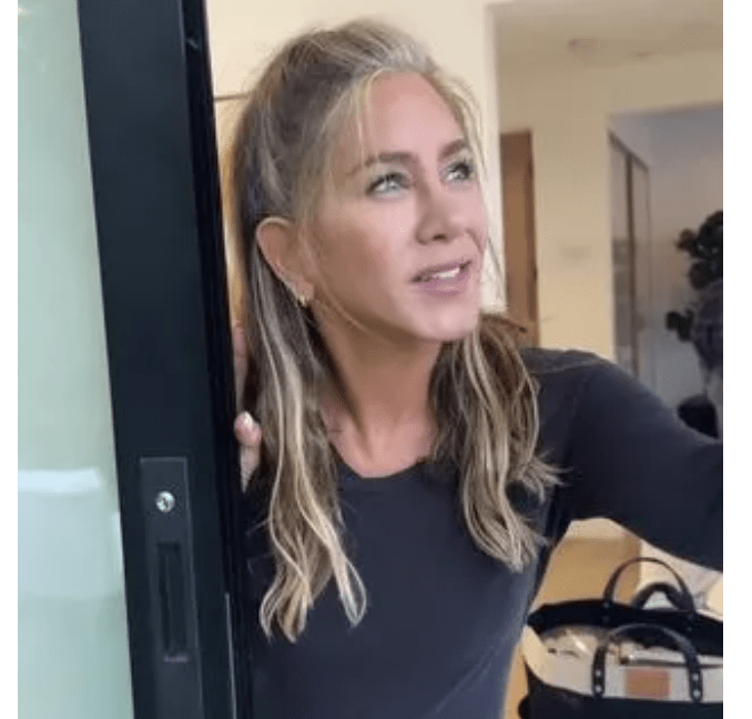 Jennifer Aniston shows off her naturally grey hairs around her face