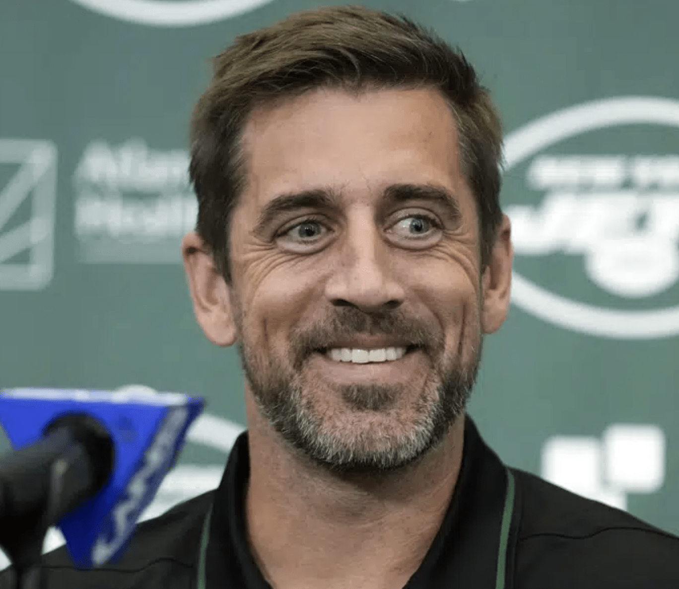 Aaron Rodgers smiles during an NFL football news conference at the Jets' training facility in Florham Park, N.J., Wednesday, April 26, 2023. Months after Colorado’s voters decided to join Oregon in decriminalizing psychedelic mushrooms, Denver will host a conference this week put on by a psychedelic advocacy group bringing together an unlikely cohort of speakers — including Rodgers, former Texas Gov. Rick Perry, and rapper Jaden Smith, the son of actor Will Smith. (AP Photo/Seth Wenig, File)