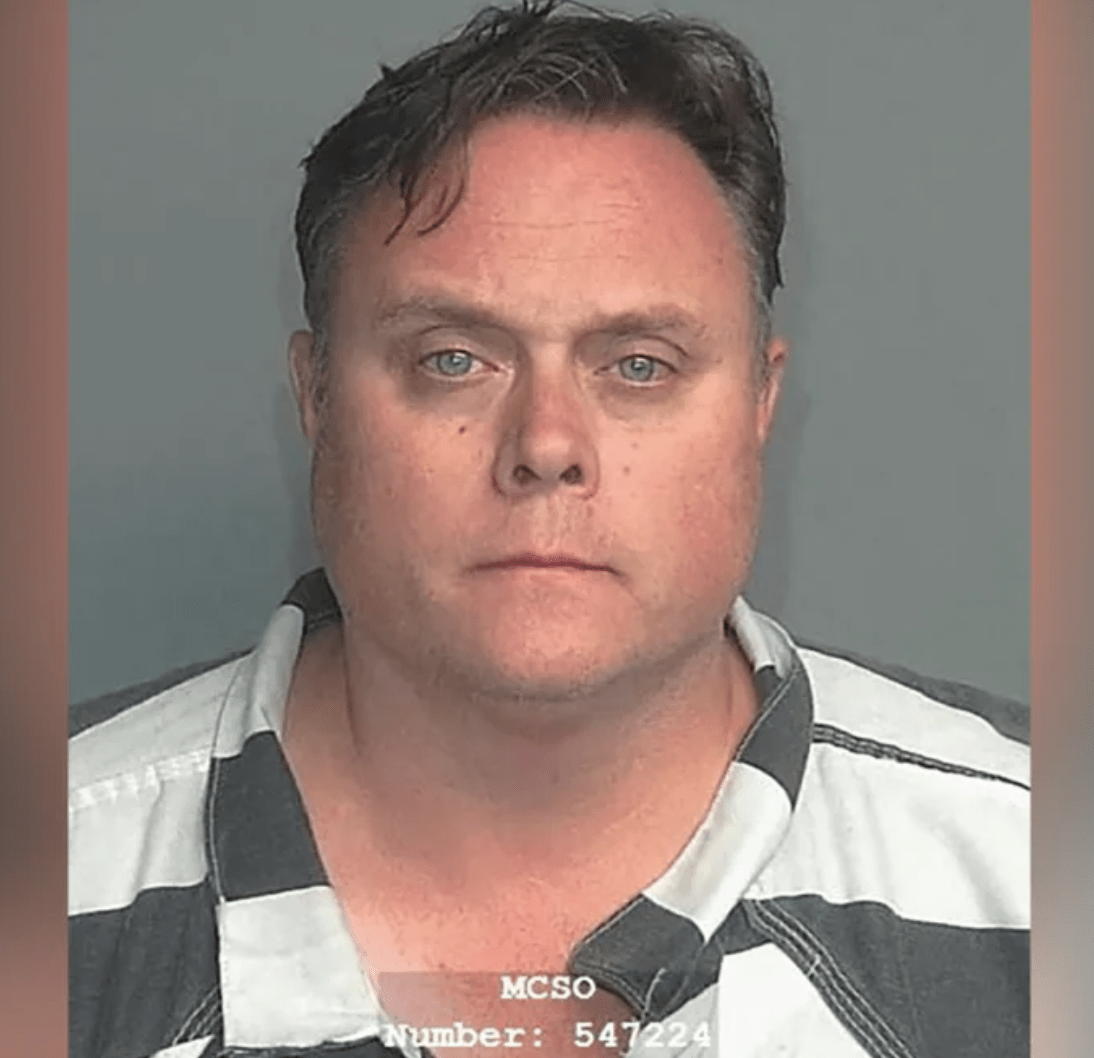David Scott, head of Exxon Mobil's shale oil and gas business, is seen in a police mug shot obtained by Reuters on October 8, 2023.
