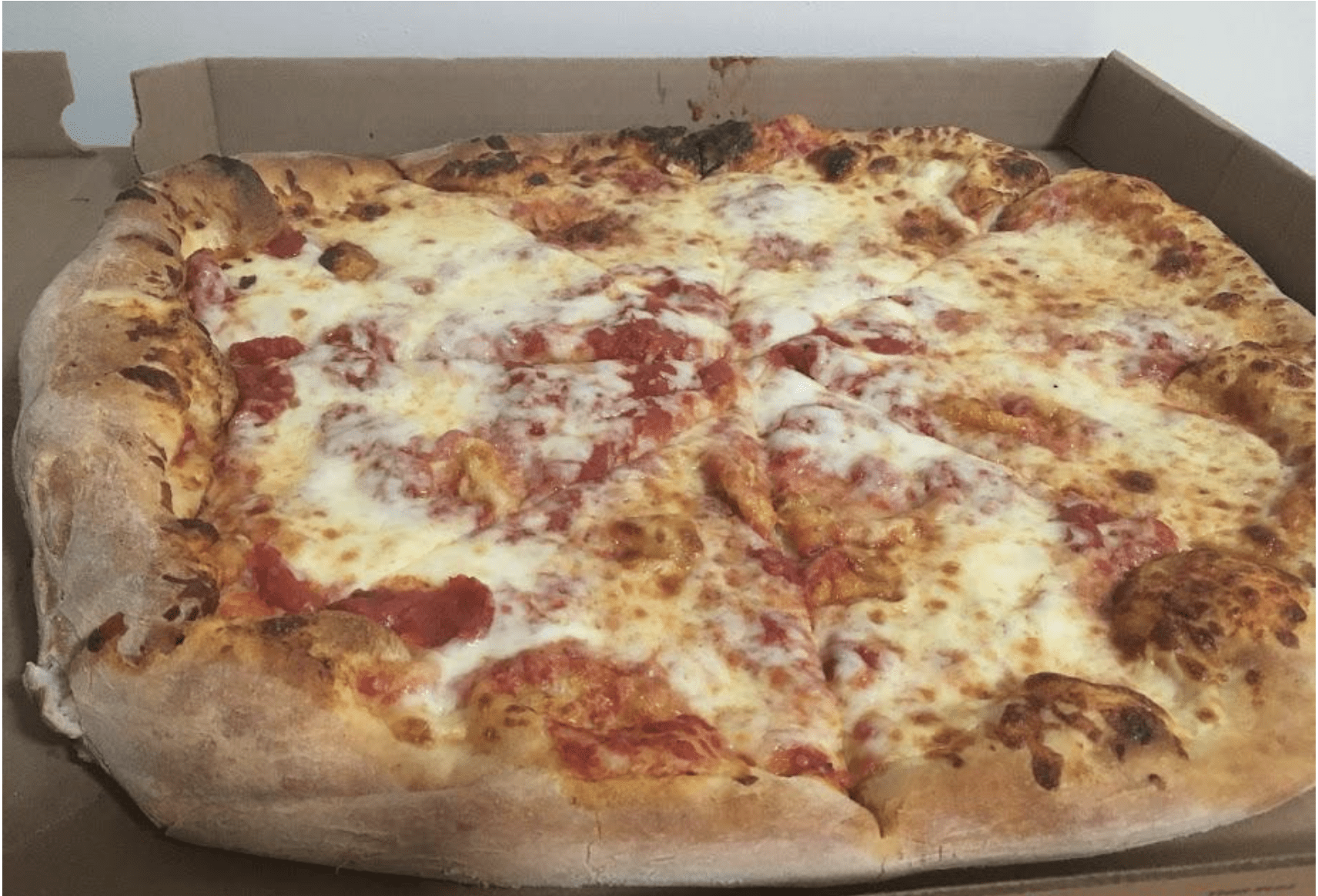 19-inch brick oven pizza made to order in 13 minutes at Market Basket locations in New England, only $8.99