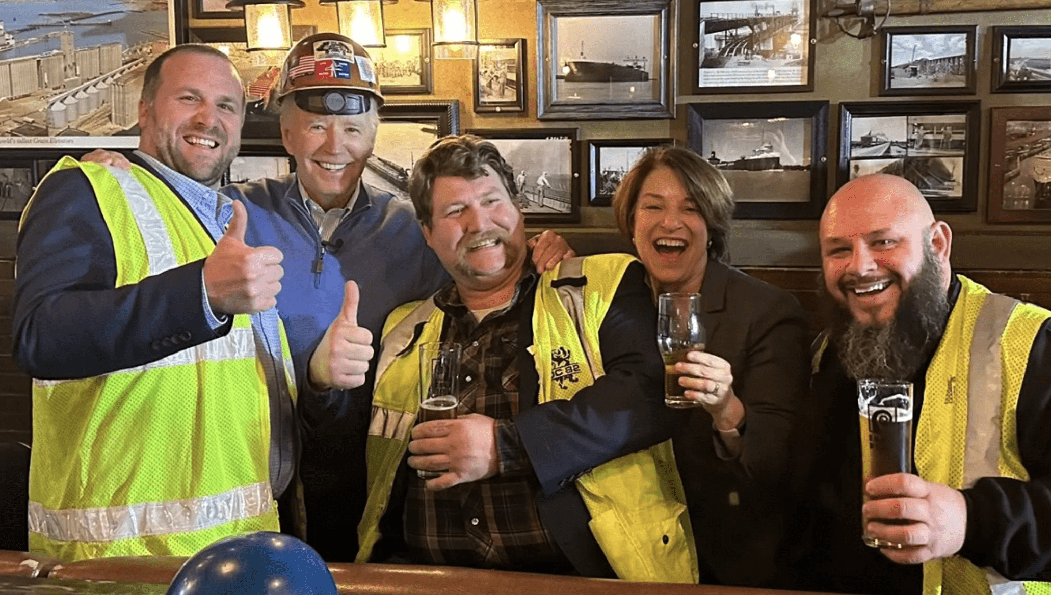 The left-leaning political fact checker Snopes reversed one of its rulings this weekend to admit that President Biden did, in fact, wear a construction hard hat backwards. (Twitter @amyklobuchar)