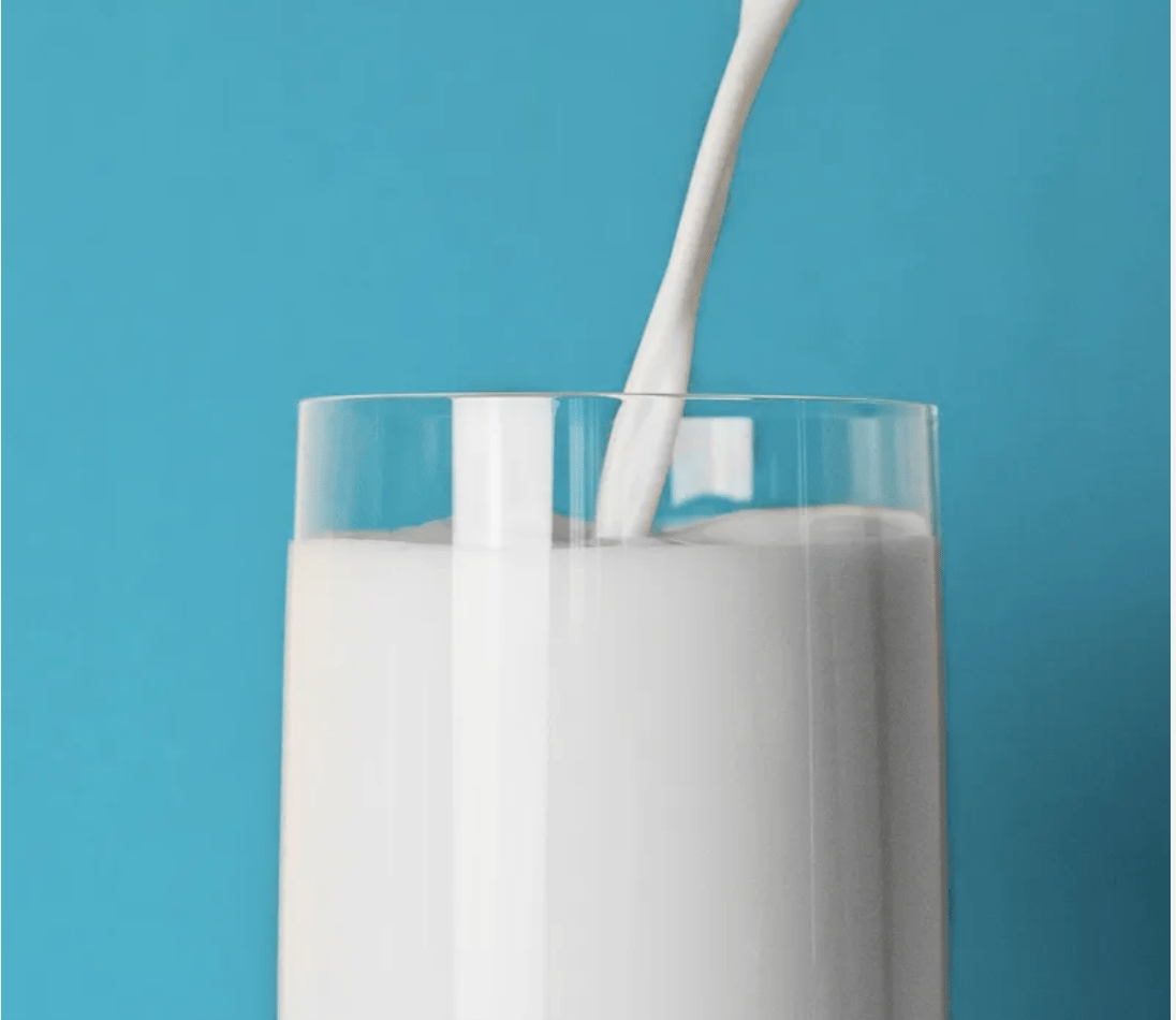 Pouring a glass of milk